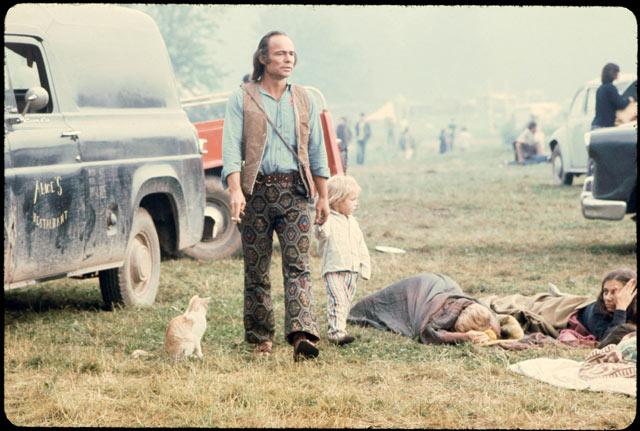 baby and cat and dad at woodstock